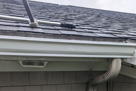 Gutter Brightening ‘Tiger Stripes’: What Causes Them and How They’re Removed